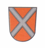 Wappen der Stadt Oettingen i.Bay.; In Rot ein silberner Schragen (Andreaskreuz)